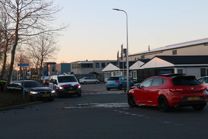 Schade na botsing op kruising