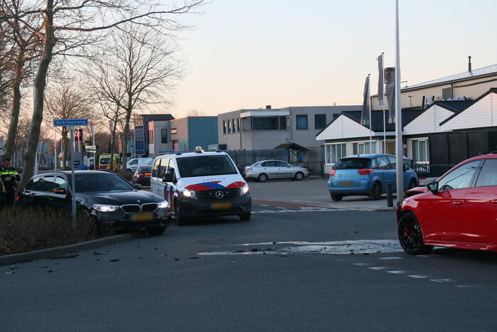 Schade na botsing op kruising