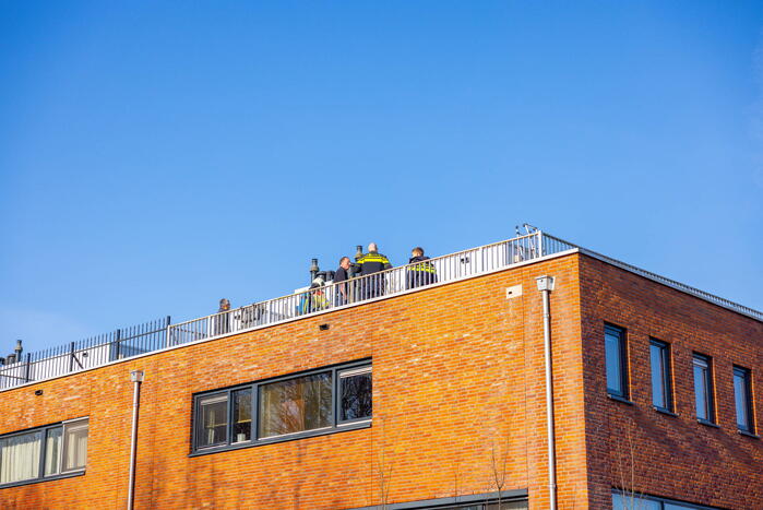 Brand in dakisolatie van woning tijdens werkzaamheden