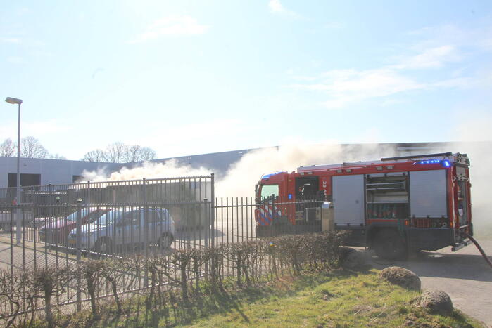 Forse rookontwikkeling bij brand in container