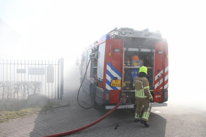 Forse rookontwikkeling bij brand in container