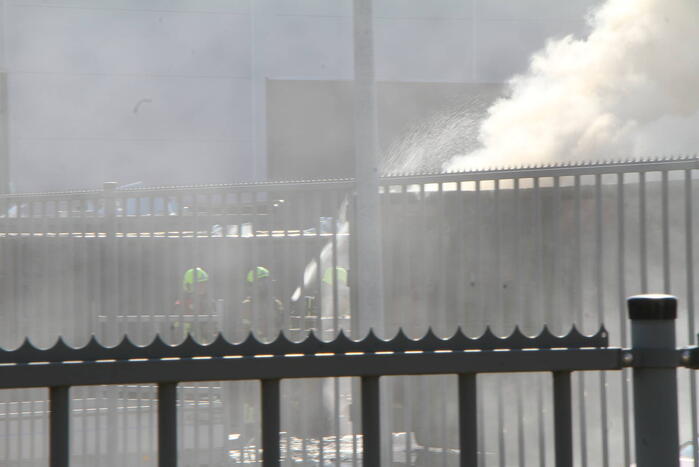 Forse rookontwikkeling bij brand in container