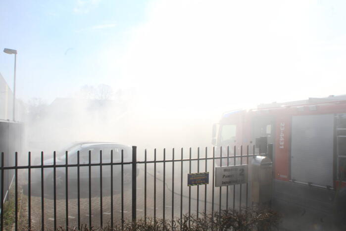 Forse rookontwikkeling bij brand in container