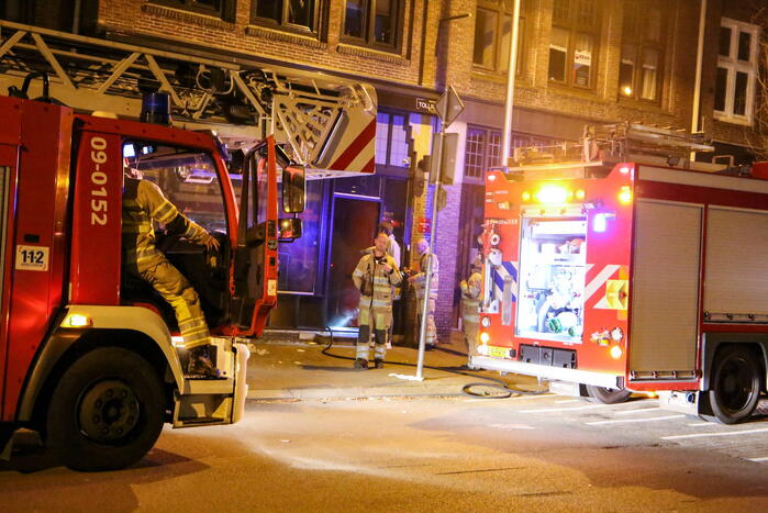 Rookontwikkeling vanwege brand in restaurant Tollius