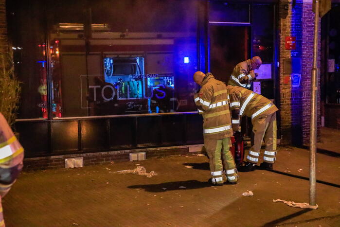 Rookontwikkeling vanwege brand in restaurant Tollius