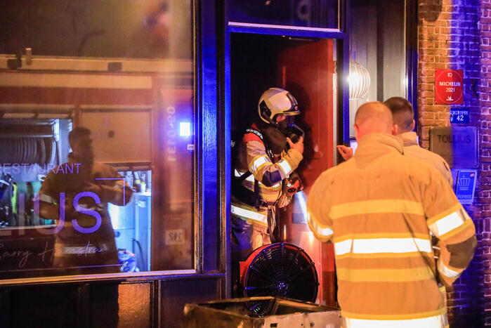 Rookontwikkeling vanwege brand in restaurant Tollius