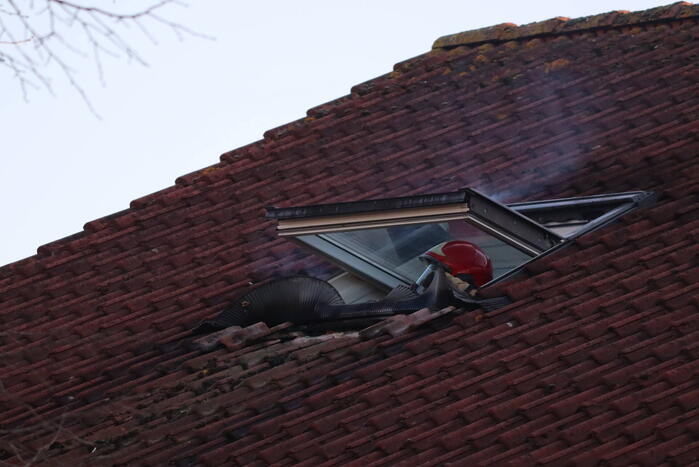 Flinke brand op zolder van woning