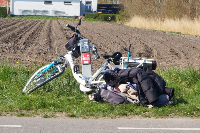 Man op fiets aangereden door afslaande tractor