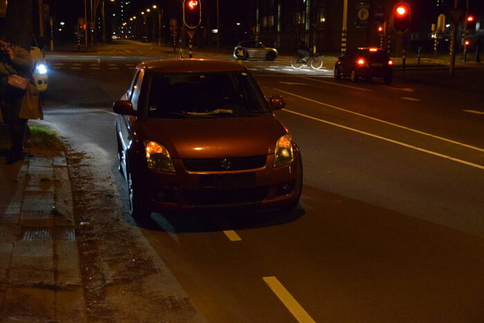 Botsing tussen personenauto en scooterrijder