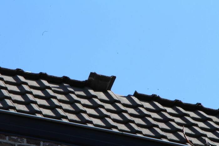 Dakpannen zorgen voor gevaarlijk situatie