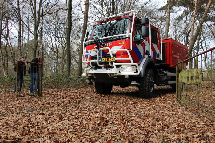 Rookontwikkeling vanwege brand in stuk bosschage