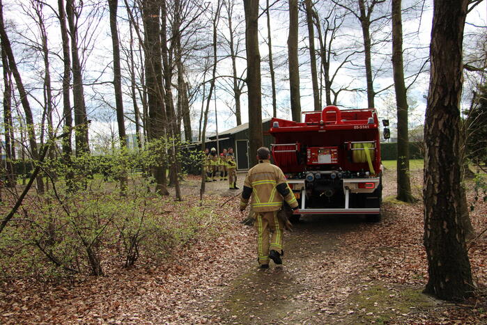 Rookontwikkeling vanwege brand in stuk bosschage