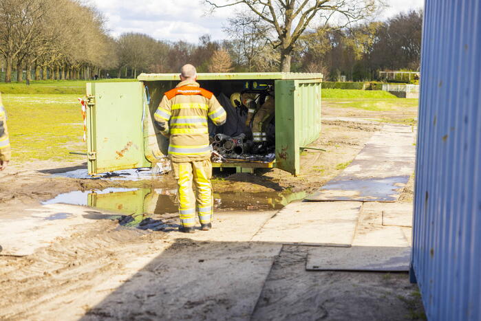 Brand in container vol asbest