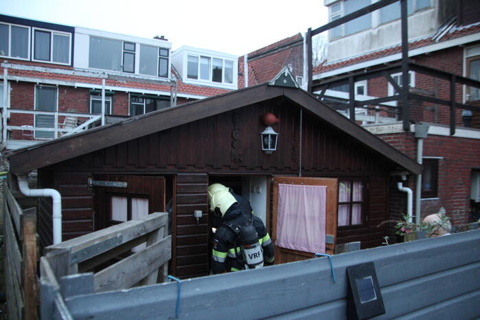 Brand in schuur achter woning