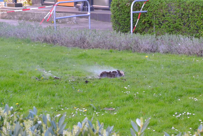 Bloempot in brand op balkon