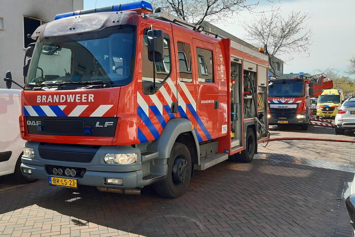 Brand in slaapkamer van portiekwoning