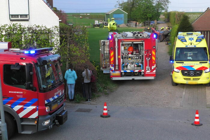 Persoon komt onder schranklader