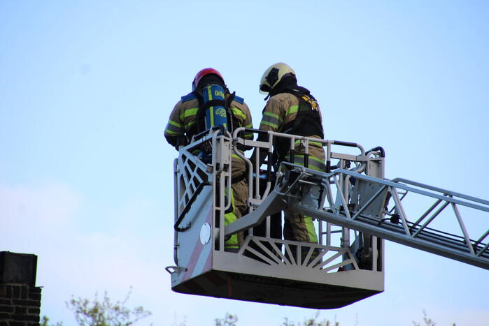 Brand in schoorsteen van woning