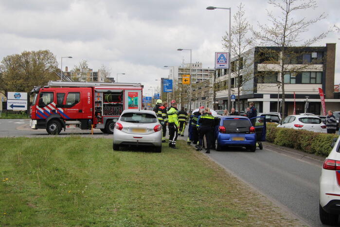 Bestuurder bekneld bij kop-staart botsing