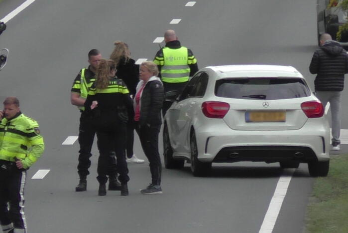 Auto belandt op zijkant naar aanrijding