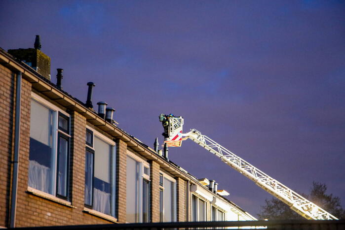 Schoorsteen geveegd na brand