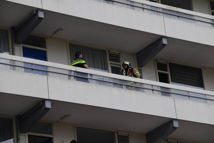 Flatwoning vol rook door vergeten pan