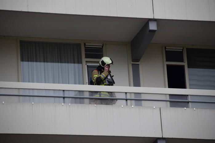 Flatwoning vol rook door vergeten pan