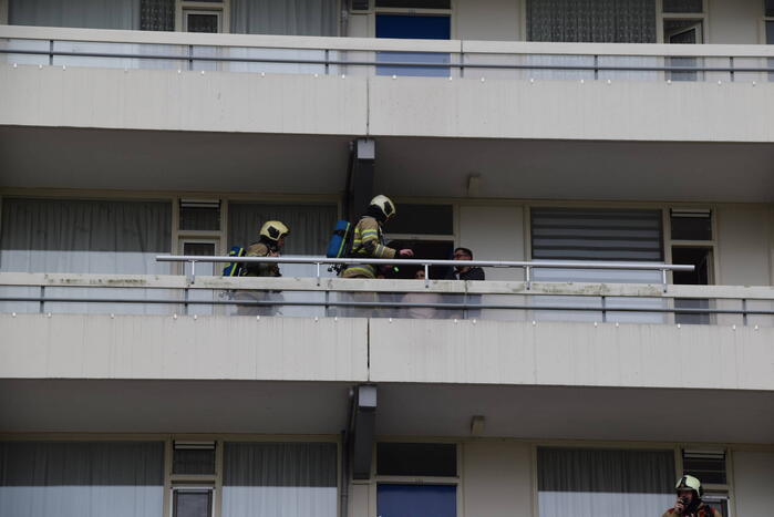 Flatwoning vol rook door vergeten pan