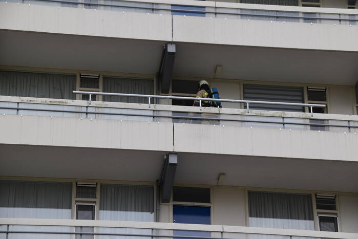 Flatwoning vol rook door vergeten pan
