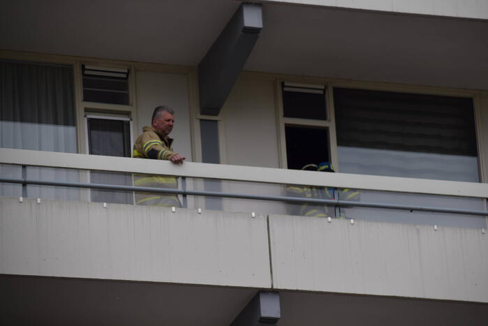 Flatwoning vol rook door vergeten pan