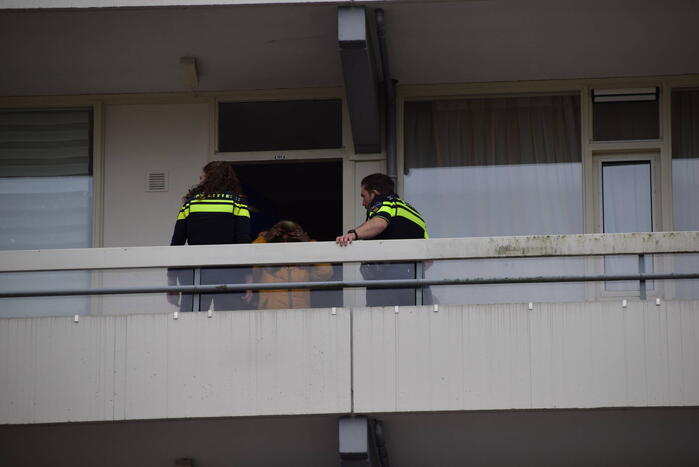Flatwoning vol rook door vergeten pan