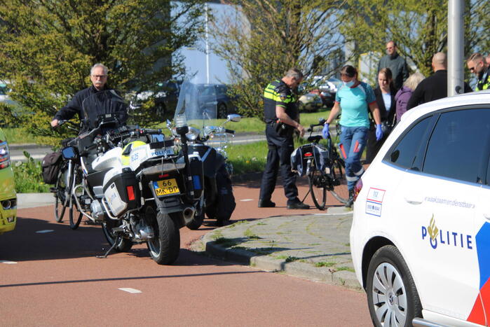 Scooter en fietser botsen op fietspad