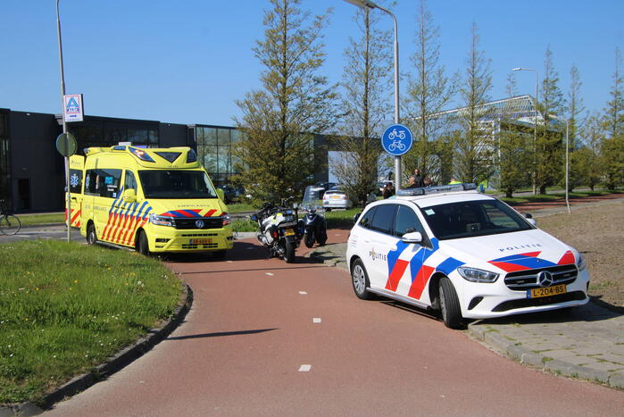 Scooter en fietser botsen op fietspad
