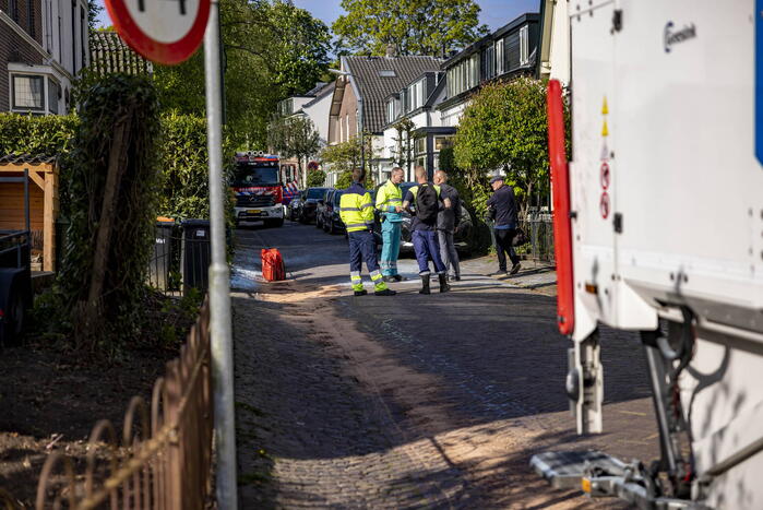 Vuilnisman raakt gewond bij blusactie