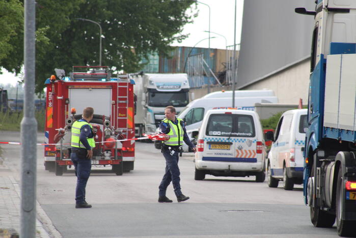 Brand in loods met papier