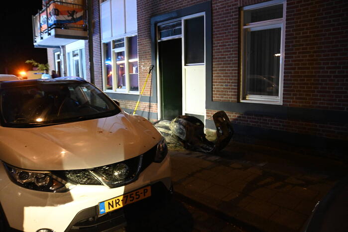 Woningen ontruimd door scooterbrand