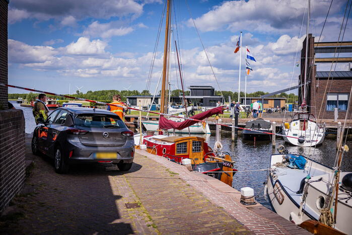 Schipper redt persoon uit het water