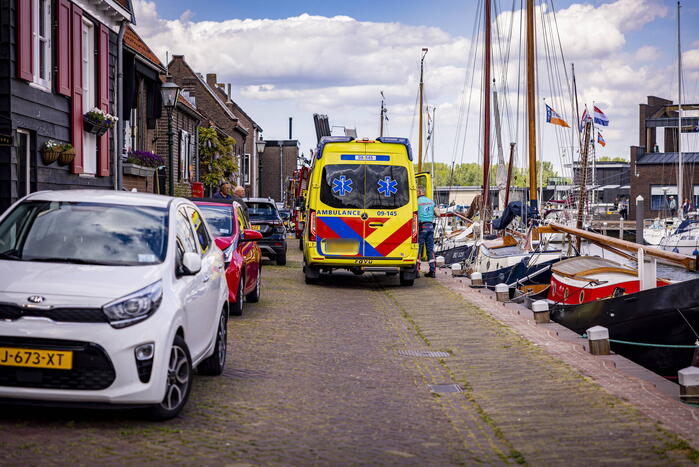 Schipper redt persoon uit het water