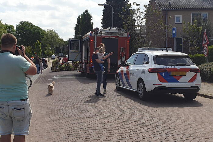 Kind vast in spaken van fiets