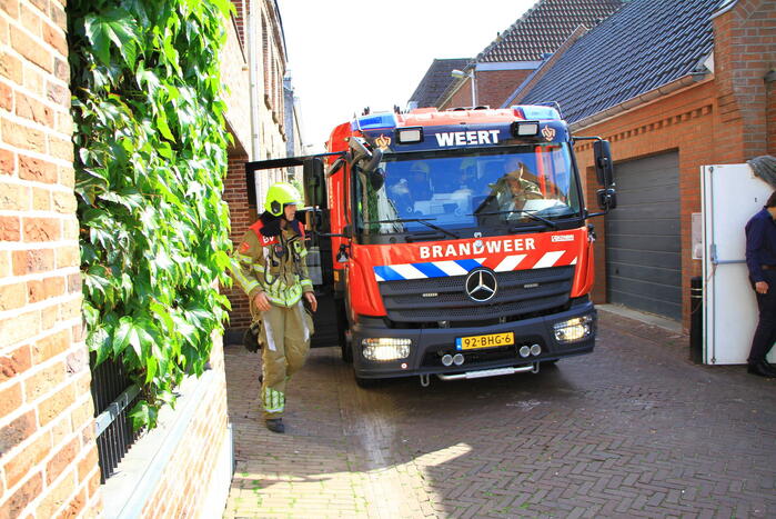 Vlam slaat in de pan bij restaurant