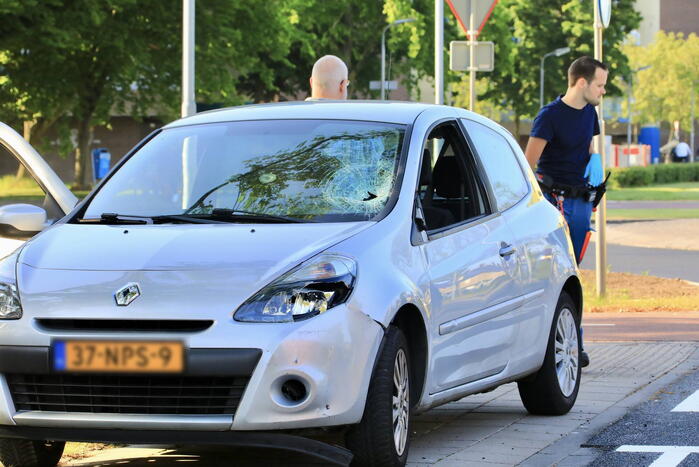 Scooter met twee opzittenden aangereden