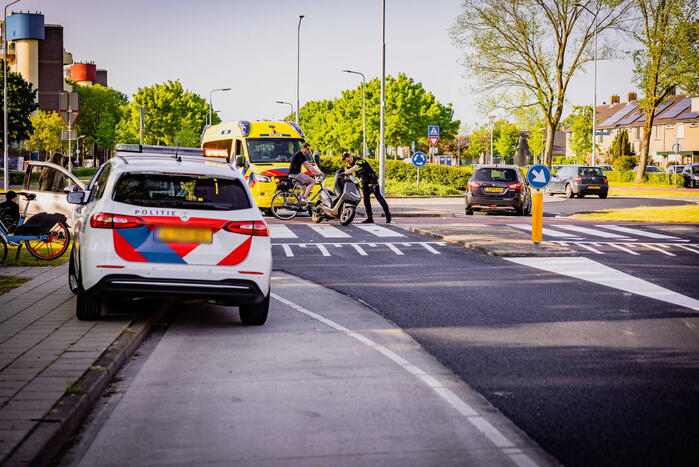 Scooter met twee opzittenden aangereden