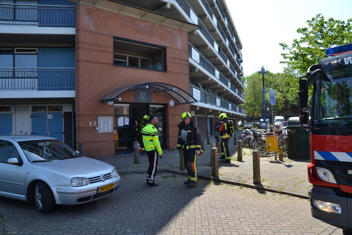 Wasmachine vliegt in brand in woning