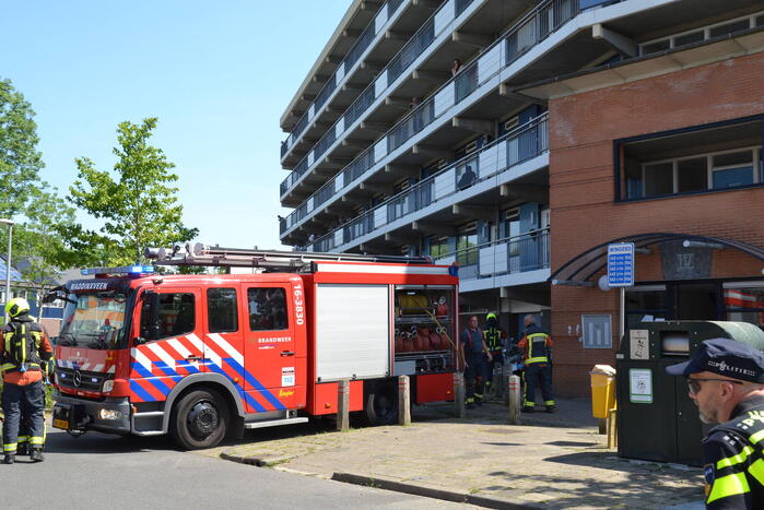 Wasmachine vliegt in brand in woning