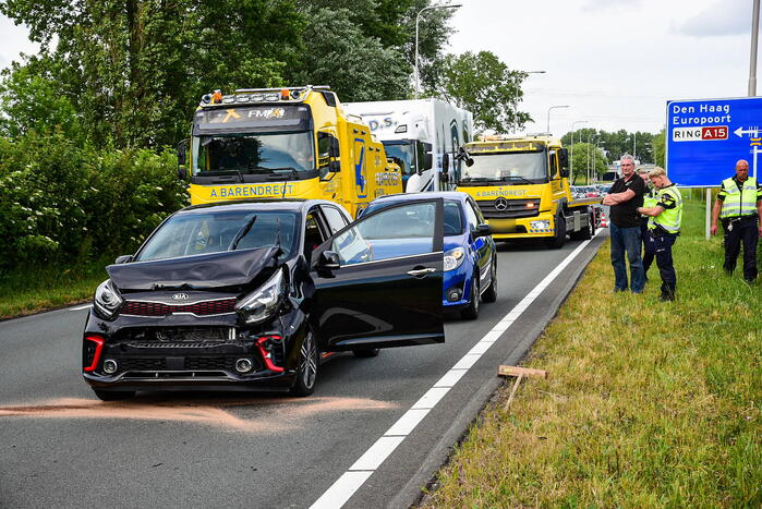 Automobiliste botst achterop Range Rover