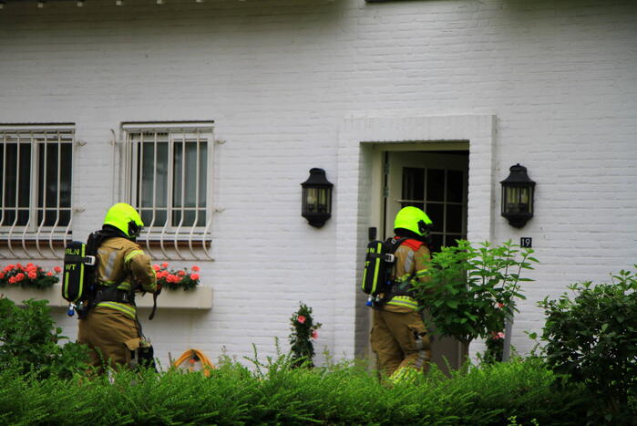 Lichte rookontwikkeling bij brand in woning