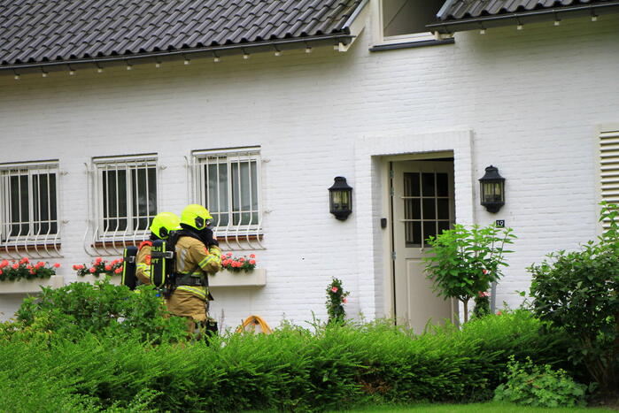 Lichte rookontwikkeling bij brand in woning