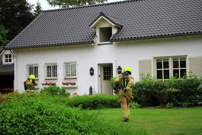 Lichte rookontwikkeling bij brand in woning