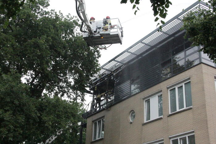 Enorme schade na brand in flatwoning