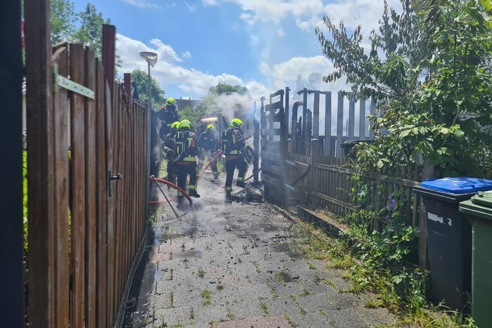 Schuur en schuttingen verwoest vanwege brand